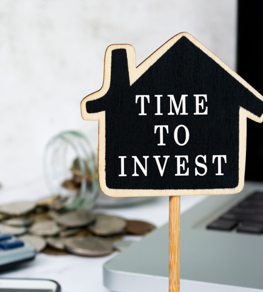 a homw billbooard with a sign time to invest.